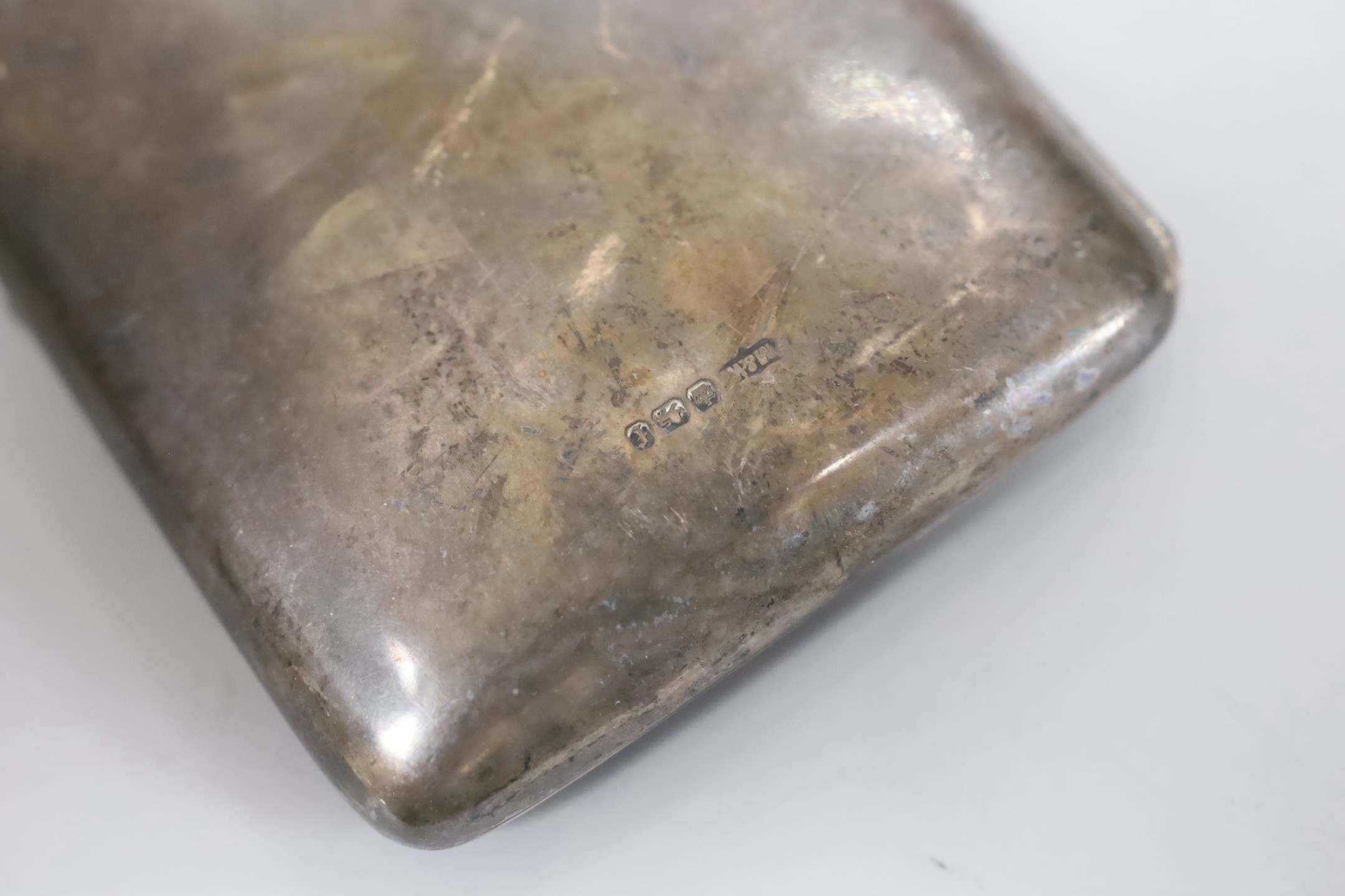 A late Victorian silver cigarette case with 1899 inscription, Mappin & Webb, Sheffield, 1898, 13.1cm.